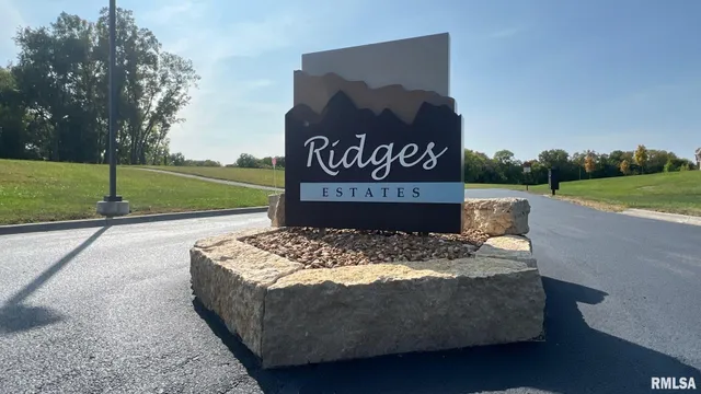 a wooden bench sitting in the middle of a park