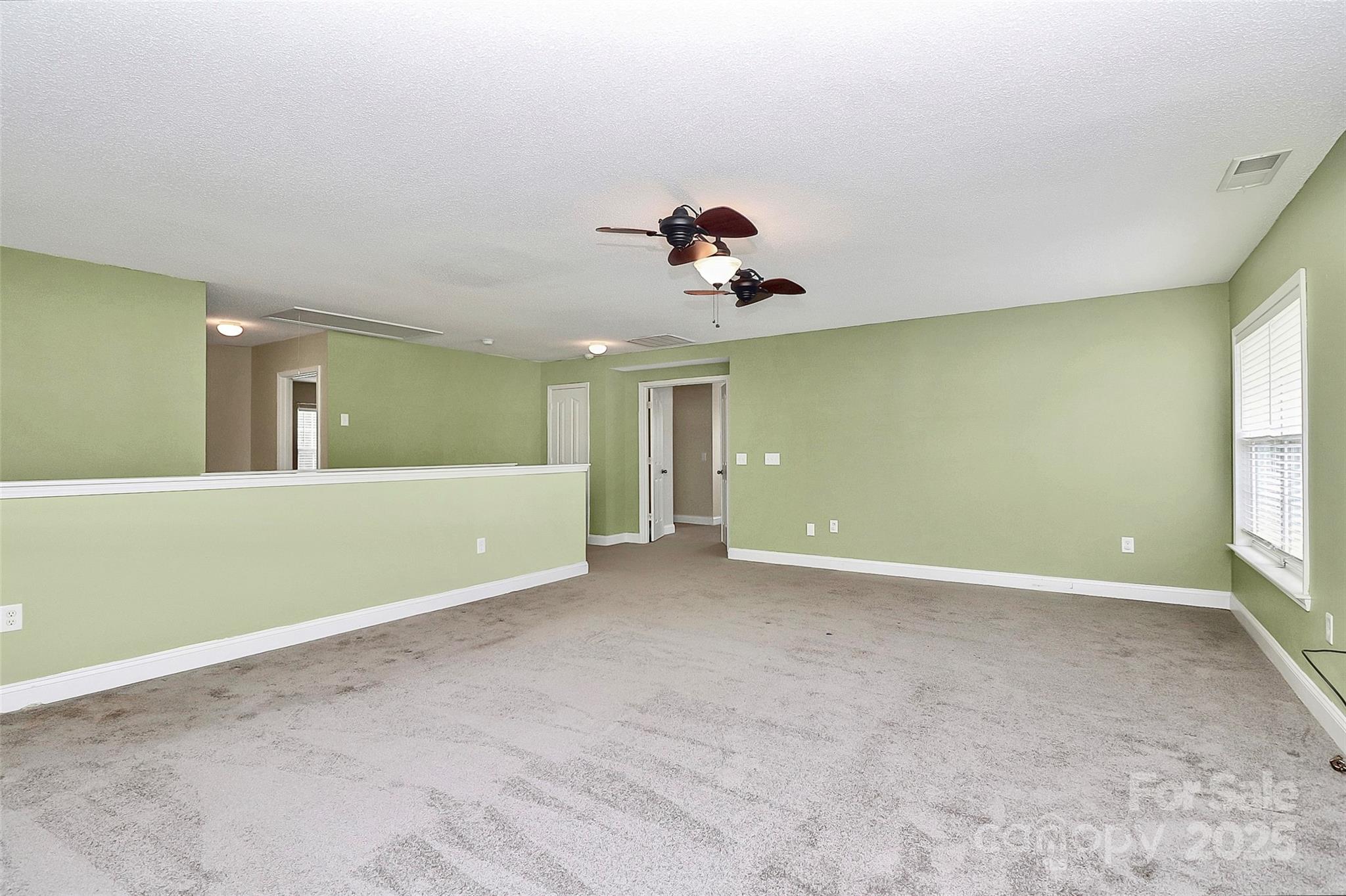 7827 Kuck Road Mint Hill, NC 28227 - Photo 16 of 37 a view of an empty room with a window