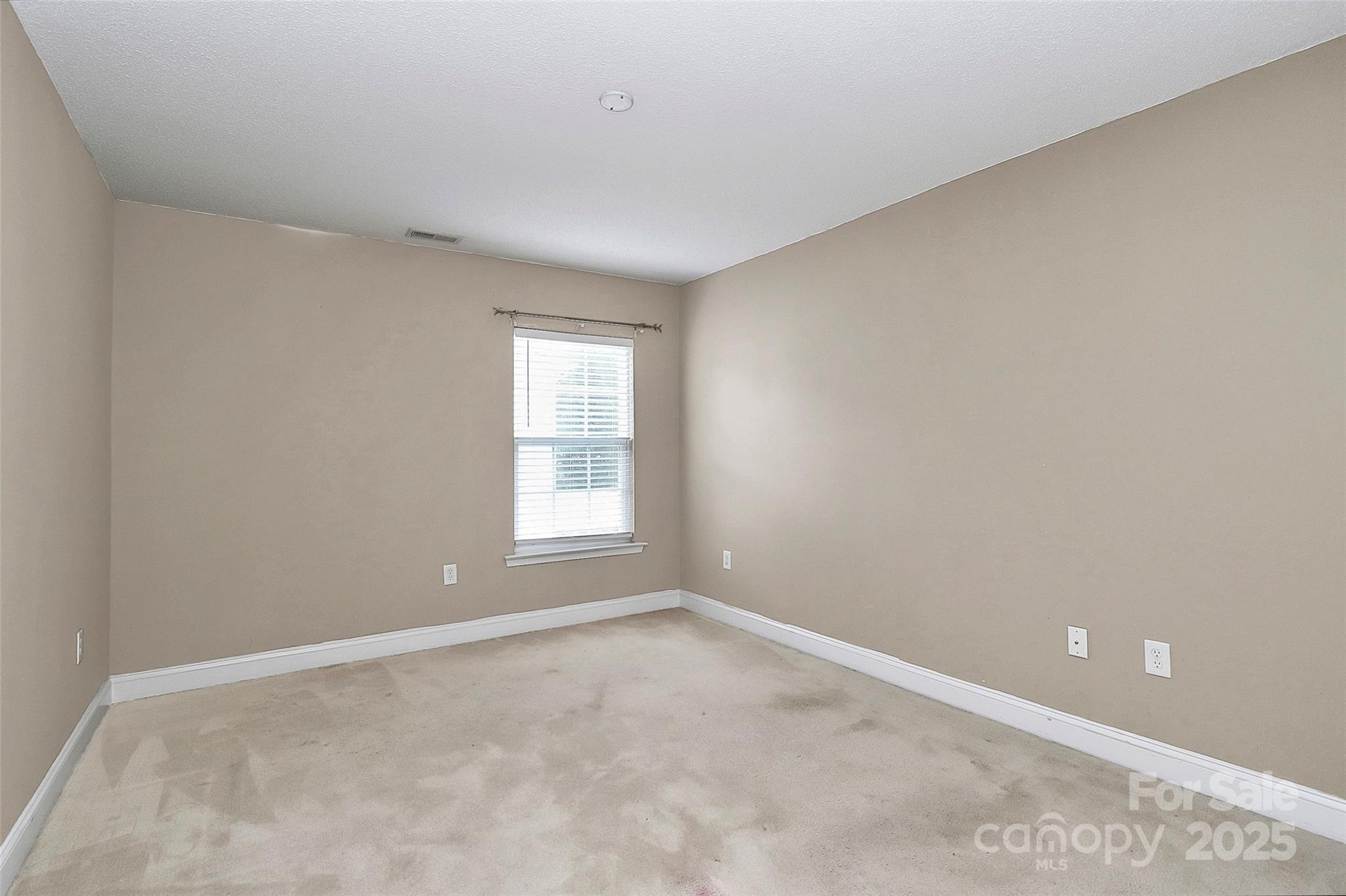 7827 Kuck Road Mint Hill, NC 28227 - Photo 18 of 37 an empty room with a window
