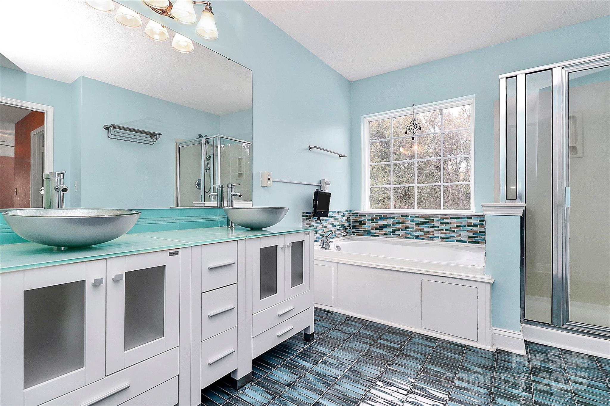 7827 Kuck Road Mint Hill, NC 28227 - Photo 26 of 37 a kitchen with stainless steel appliances kitchen island granite countertop a sink and cabinets