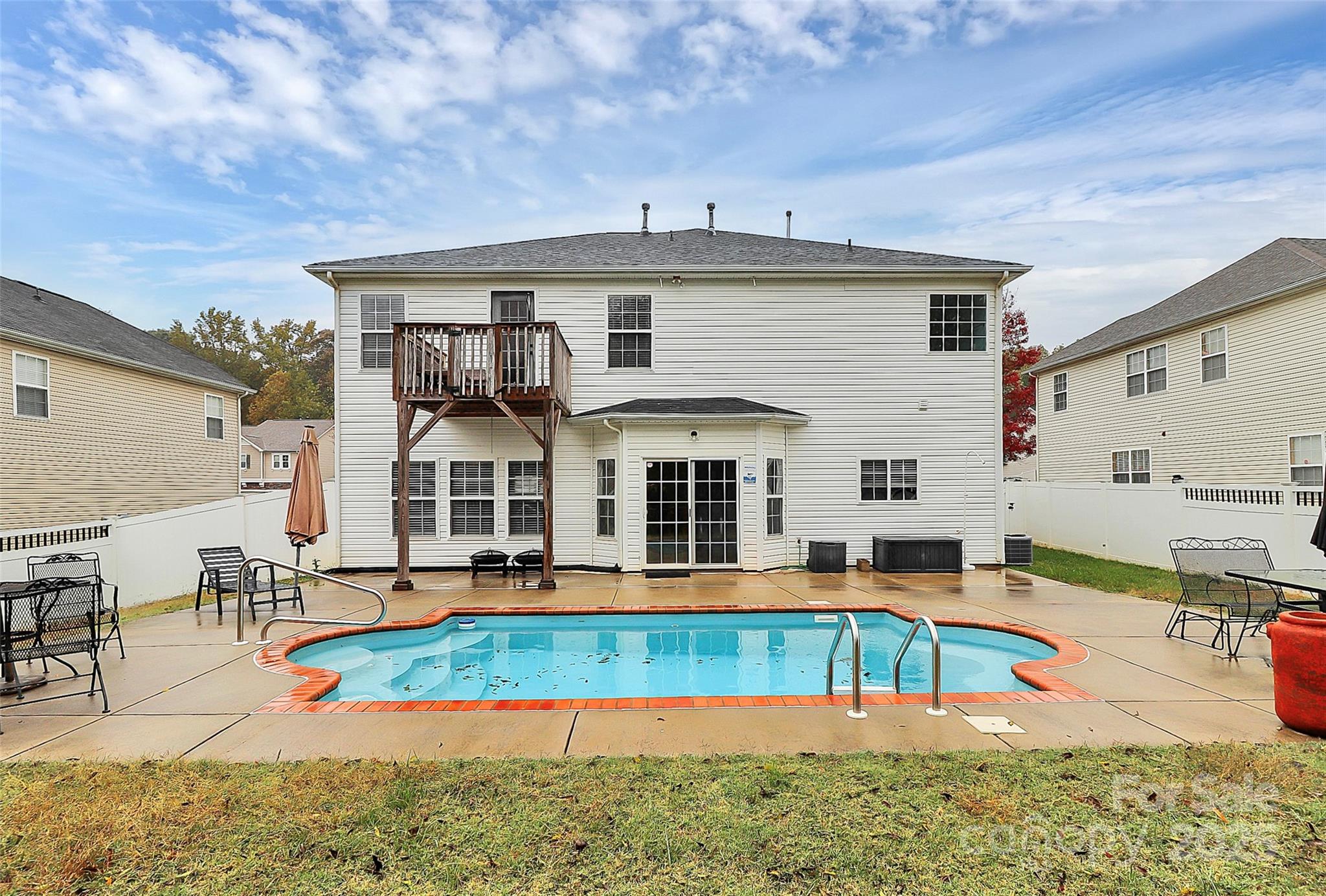 7827 Kuck Road Mint Hill, NC 28227 - Photo 37 of 37 a view of a house with swimming pool and sitting area