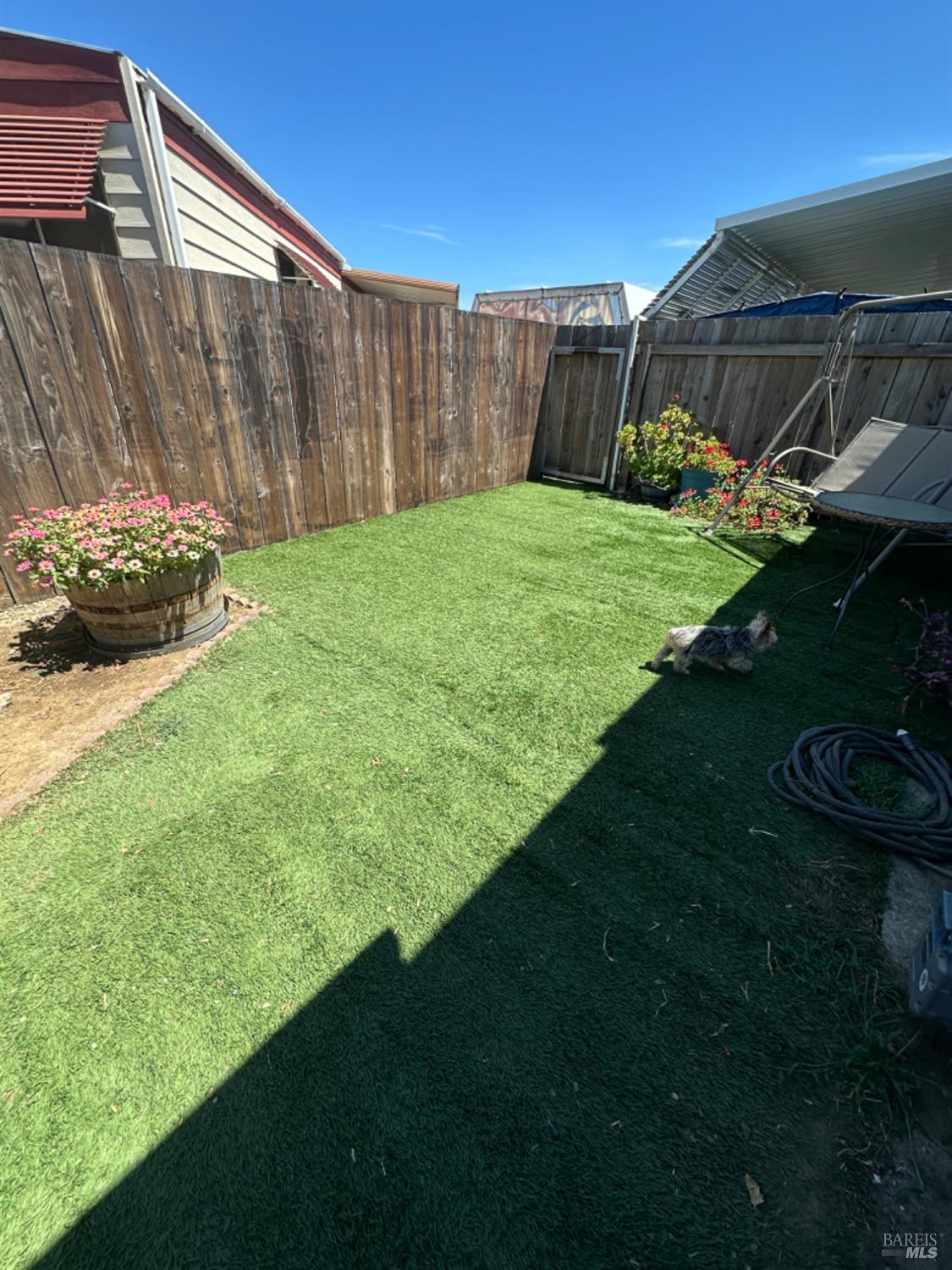102 Royal Oak Court, Unit 102 Fairfield, CA 94533 - Photo 27 of 32 a view of a backyard of the house