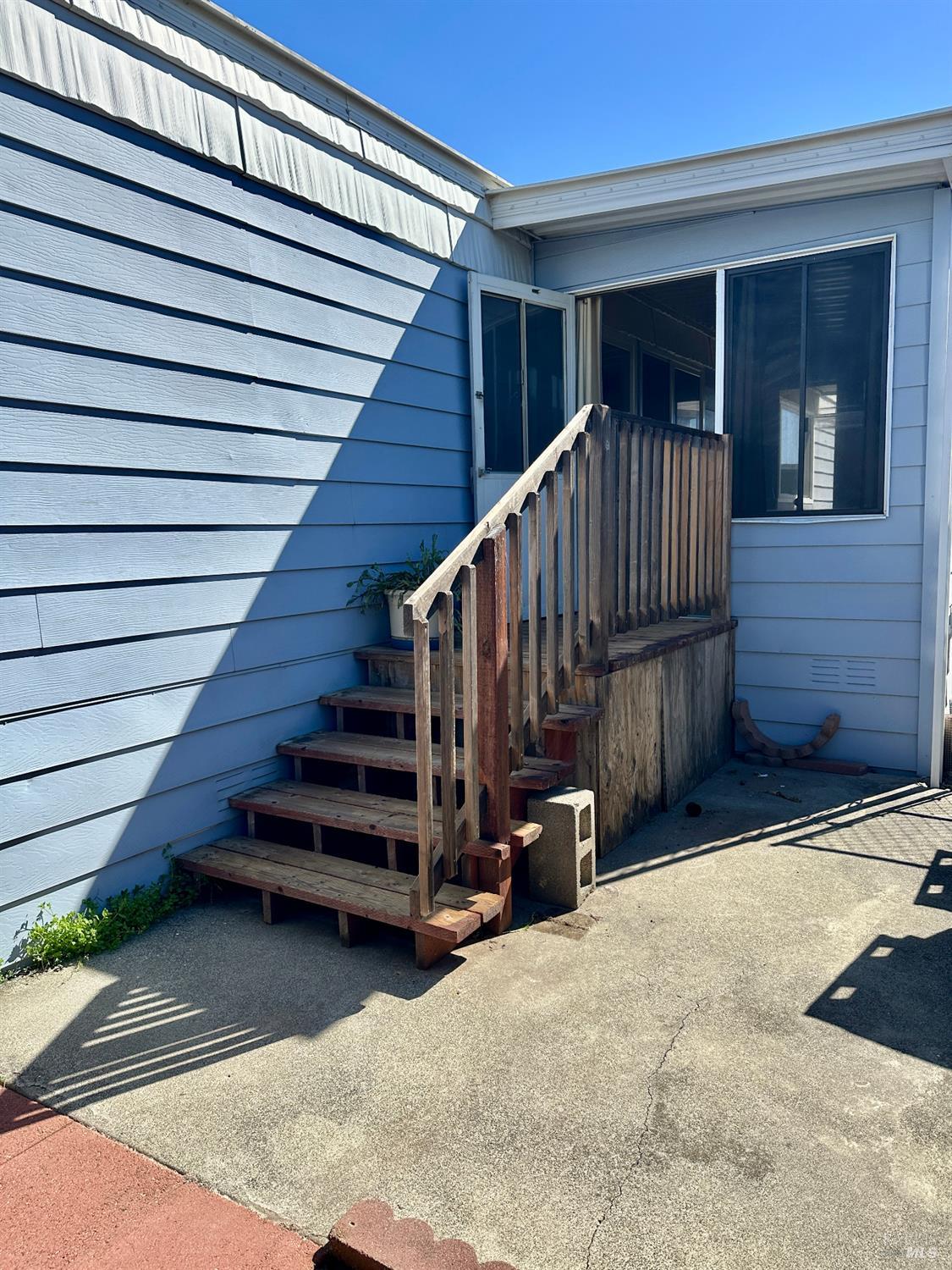 102 Royal Oak Court, Unit 102 Fairfield, CA 94533 - Photo 28 of 32 a view of entryway with wooden stairs