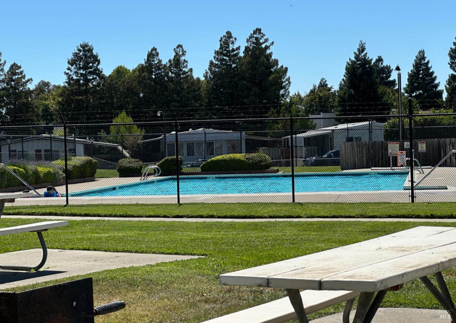 102 Royal Oak Court, Unit 102 Fairfield, CA 94533 - Photo 32 of 32 a view of a table and chairs in the yard