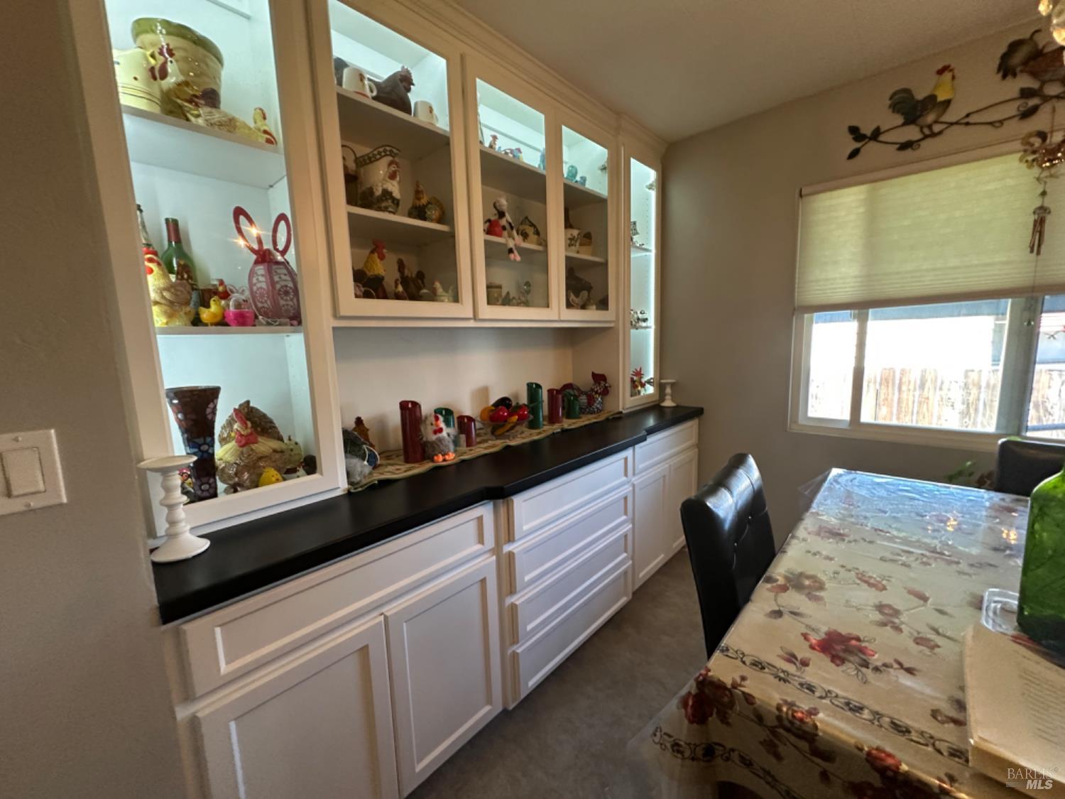 102 Royal Oak Court, Unit 102 Fairfield, CA 94533 - Photo 5 of 32 a bed sitting in a bedroom next to a window