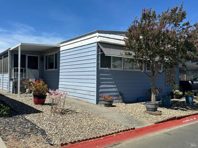 a view of a house with a patio