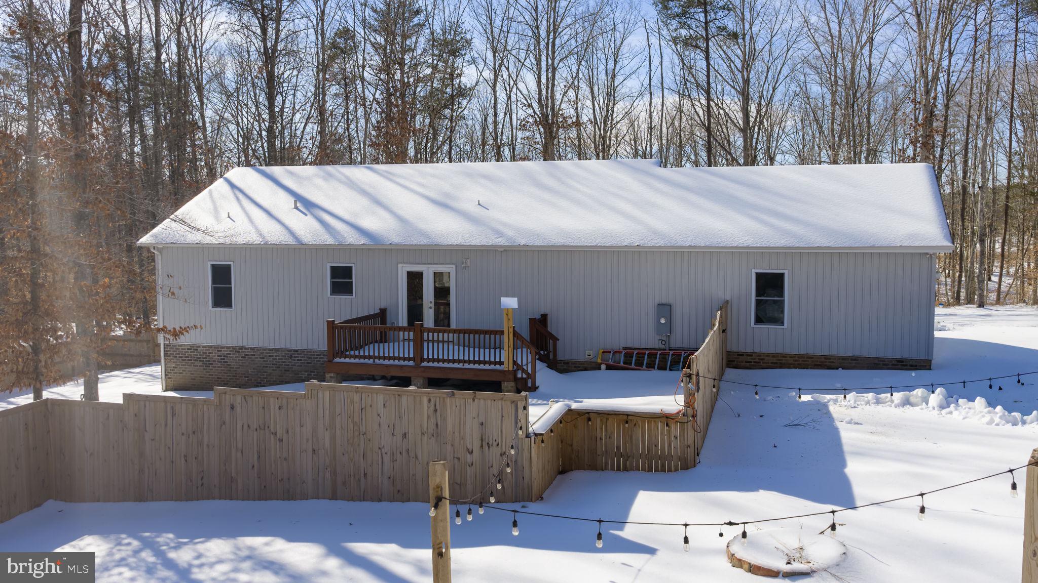 820 Kennon Road Mineral, VA 23117 - Photo 30 of 43 a view of a patio in back of house
