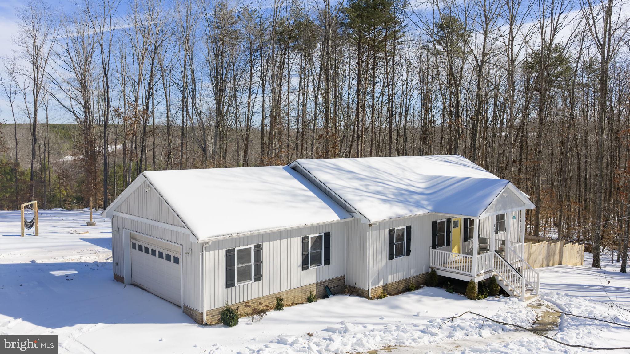 820 Kennon Road Mineral, VA 23117 - Photo 38 of 43 a roof covered with tall trees
