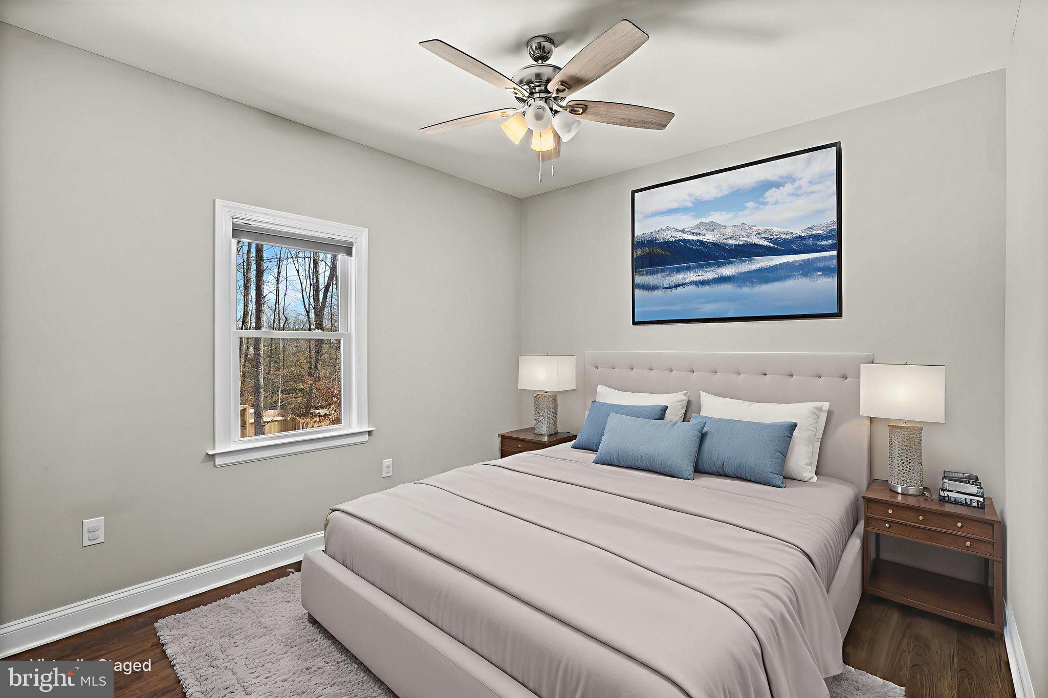 820 Kennon Road Mineral, VA 23117 - Photo 10 of 43 a bedroom with a bed and a painting on the wall