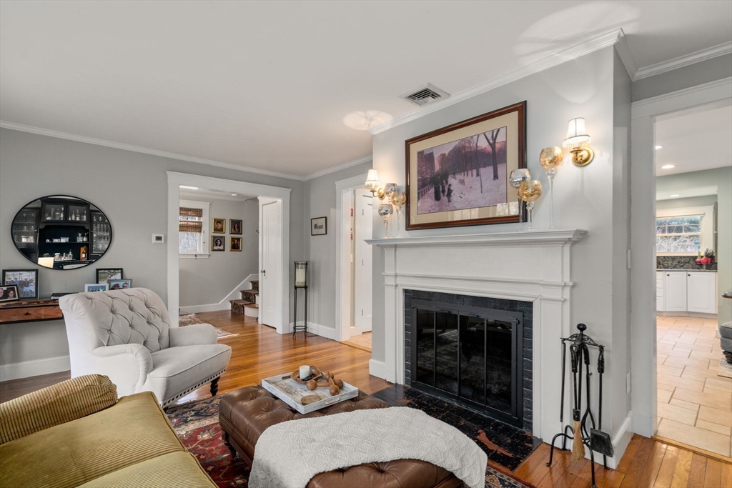 47 Summit Road Wellesley, MA 02482 - Photo 12 of 42 a living room with furniture and a fireplace