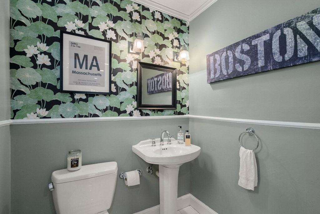 47 Summit Road Wellesley, MA 02482 - Photo 14 of 42 a bathroom with a sink and a mirror