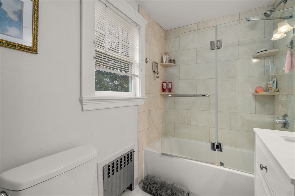 47 Summit Road Wellesley, MA 02482 - Photo 25 of 42 a bathroom with a bathtub and a shower
