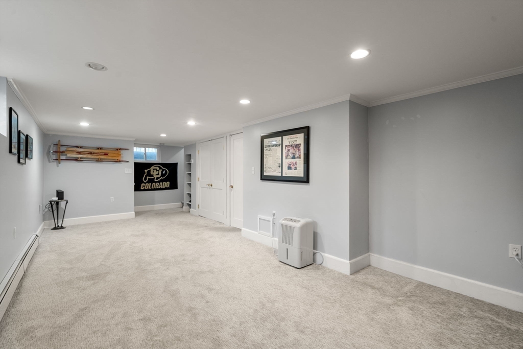 47 Summit Road Wellesley, MA 02482 - Photo 27 of 42 a view of an empty room with a window