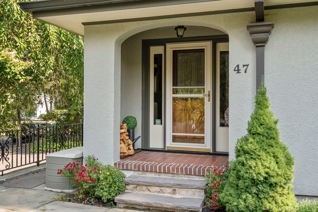 47 Summit Road Wellesley, MA 02482 - Photo 3 of 42 a front view of a house with a porch