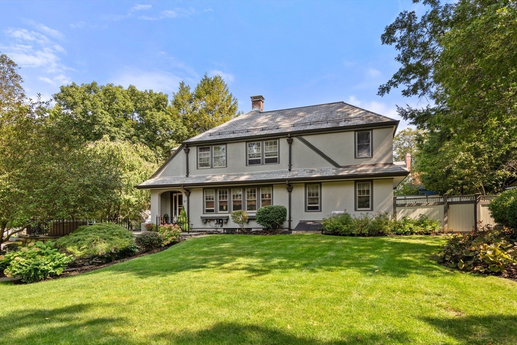 47 Summit Road Wellesley, MA 02482 - Photo 32 of 42 a front view of house with yard and green space