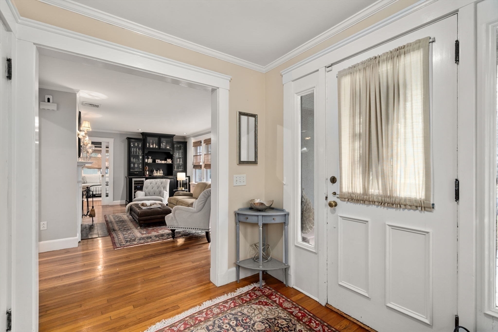 47 Summit Road Wellesley, MA 02482 - Photo 4 of 42 a living room with furniture and a rug