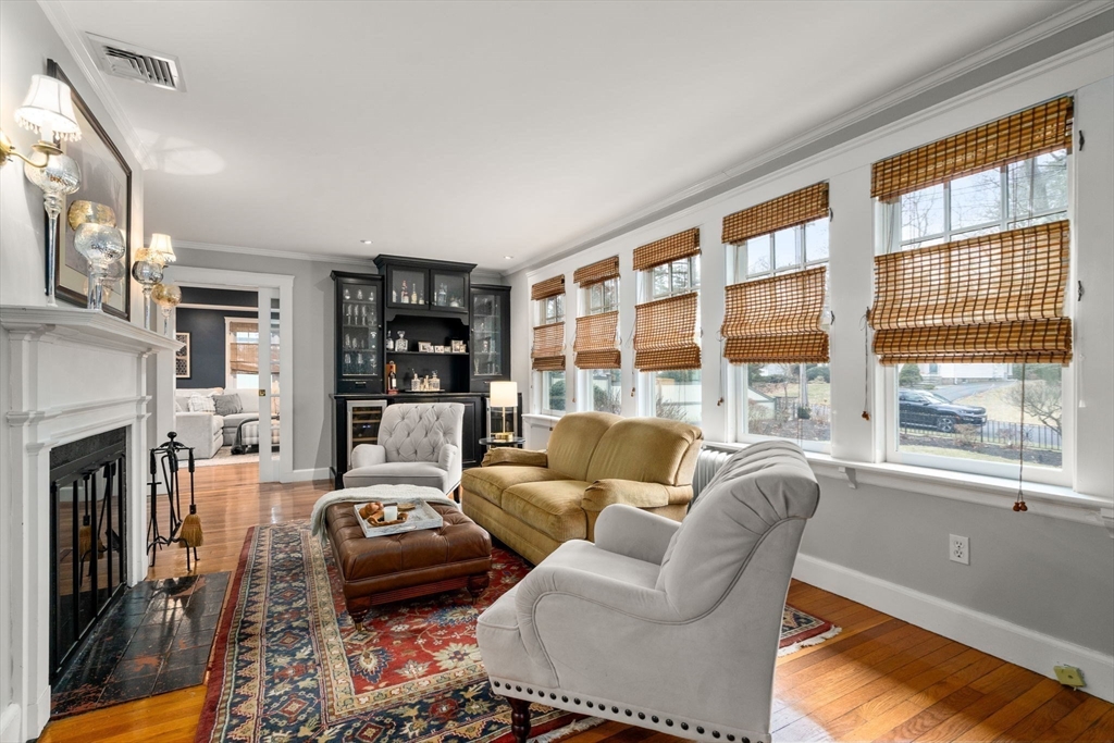 47 Summit Road Wellesley, MA 02482 - Photo 10 of 42 a living room with furniture and a fireplace