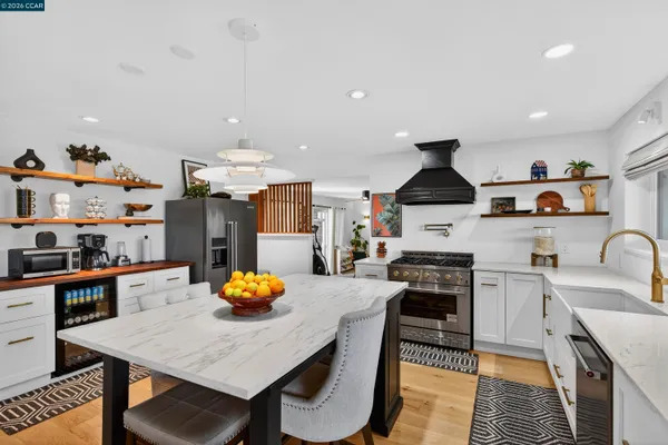 a kitchen with a sink and a window