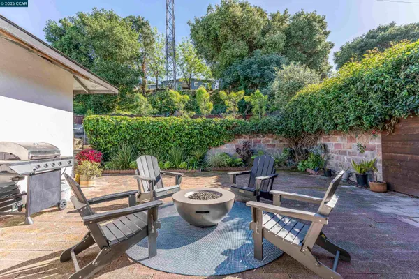 an aerial view of residential house and sandy dunes