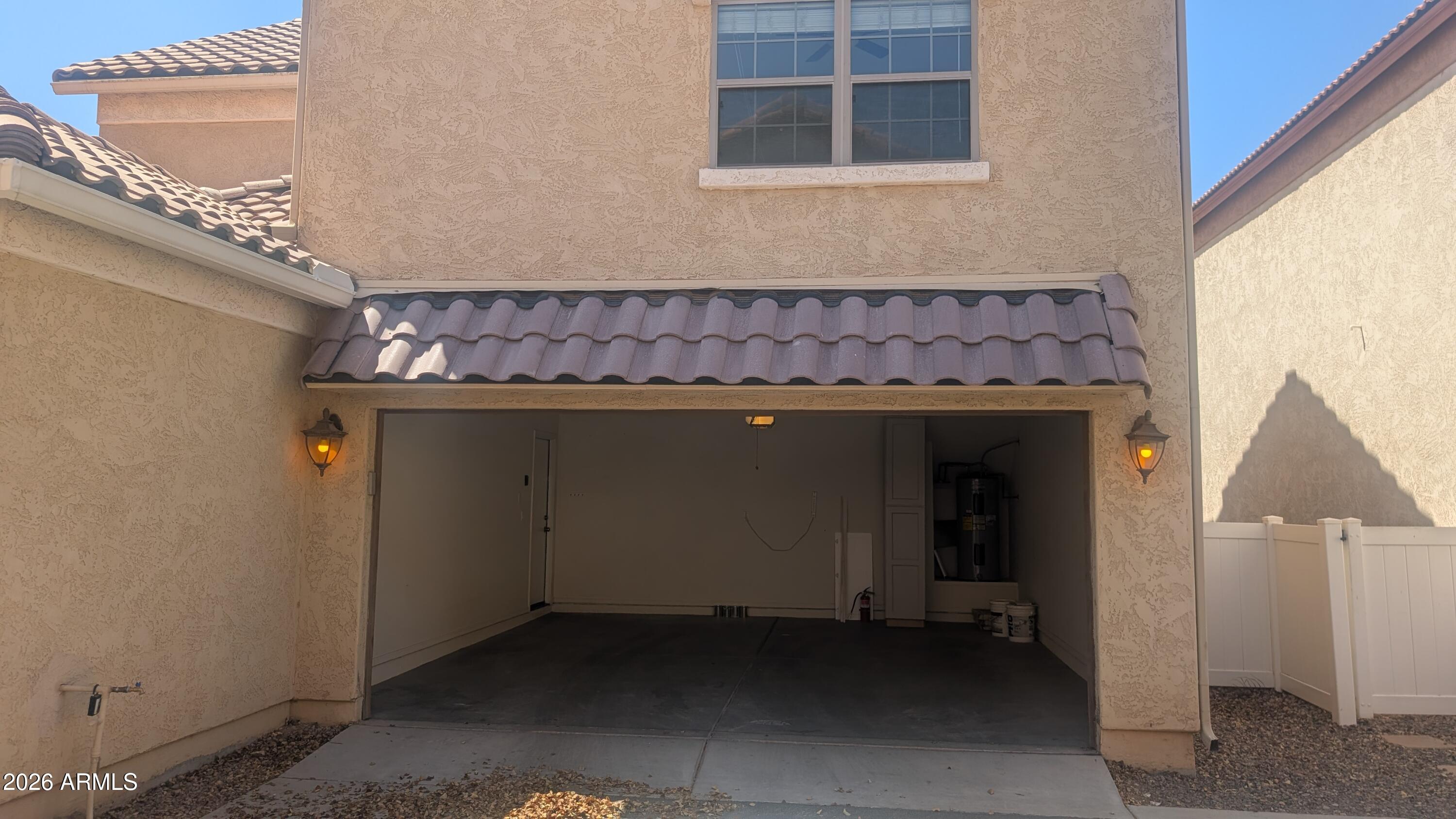 1453 South Sinova Avenue Gilbert, AZ 85296 - Photo 44 of 46 a room with a table and chair