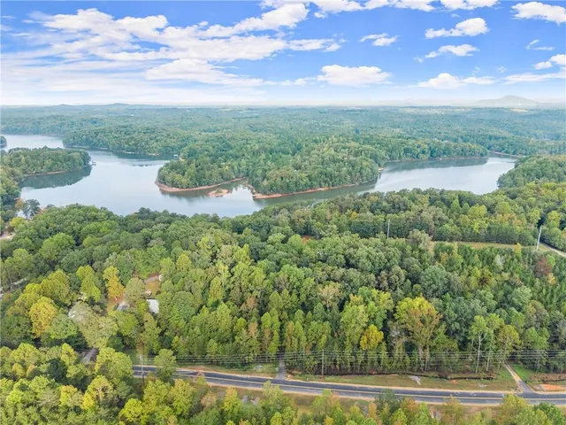 a view of a lake with a yard