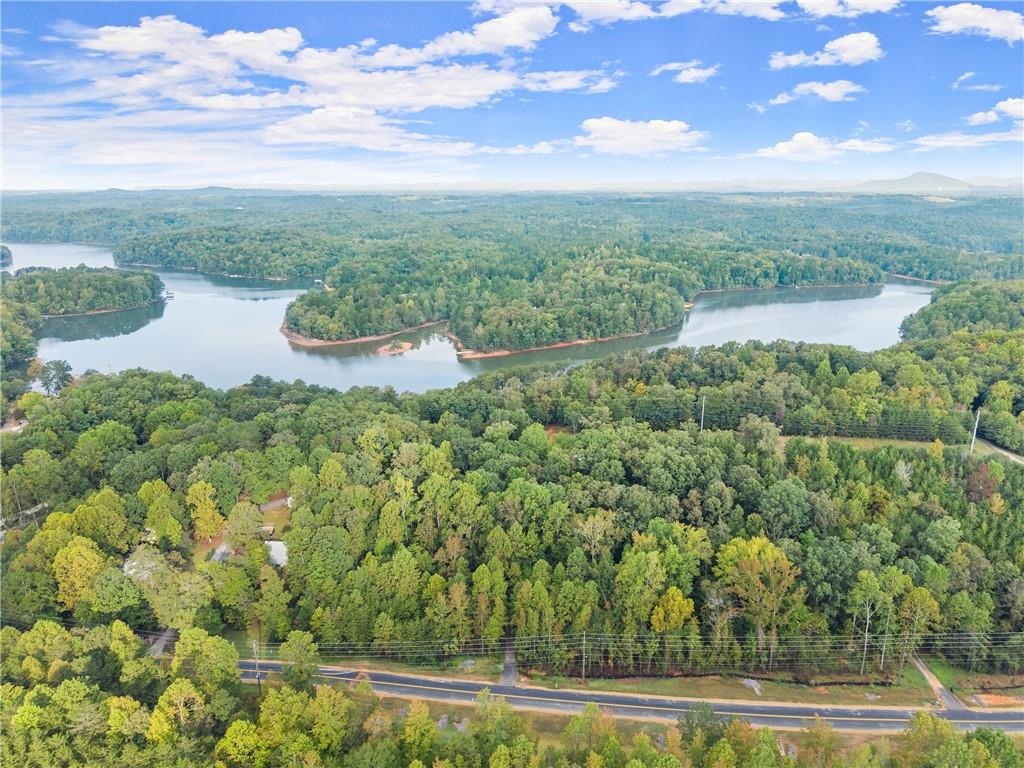 a view of a lake with a yard