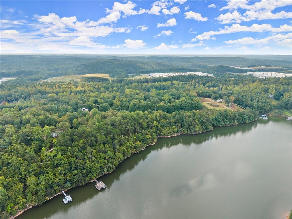 4193 Cagle Road Lula, GA 30554 - Photo 6 of 24 a view of a lake with a city