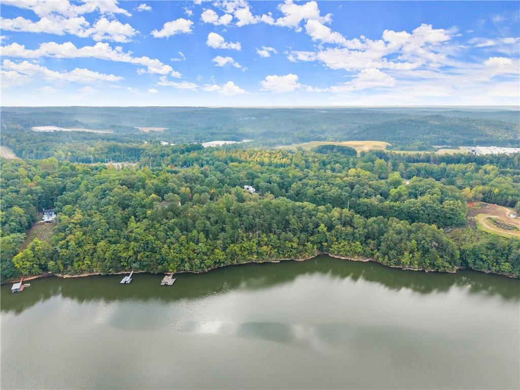 4193 Cagle Road Lula, GA 30554 - Photo 7 of 24 a view of a lake with houses in back