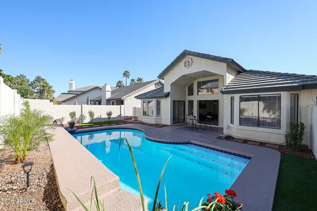 a front view of house with yard and seating area