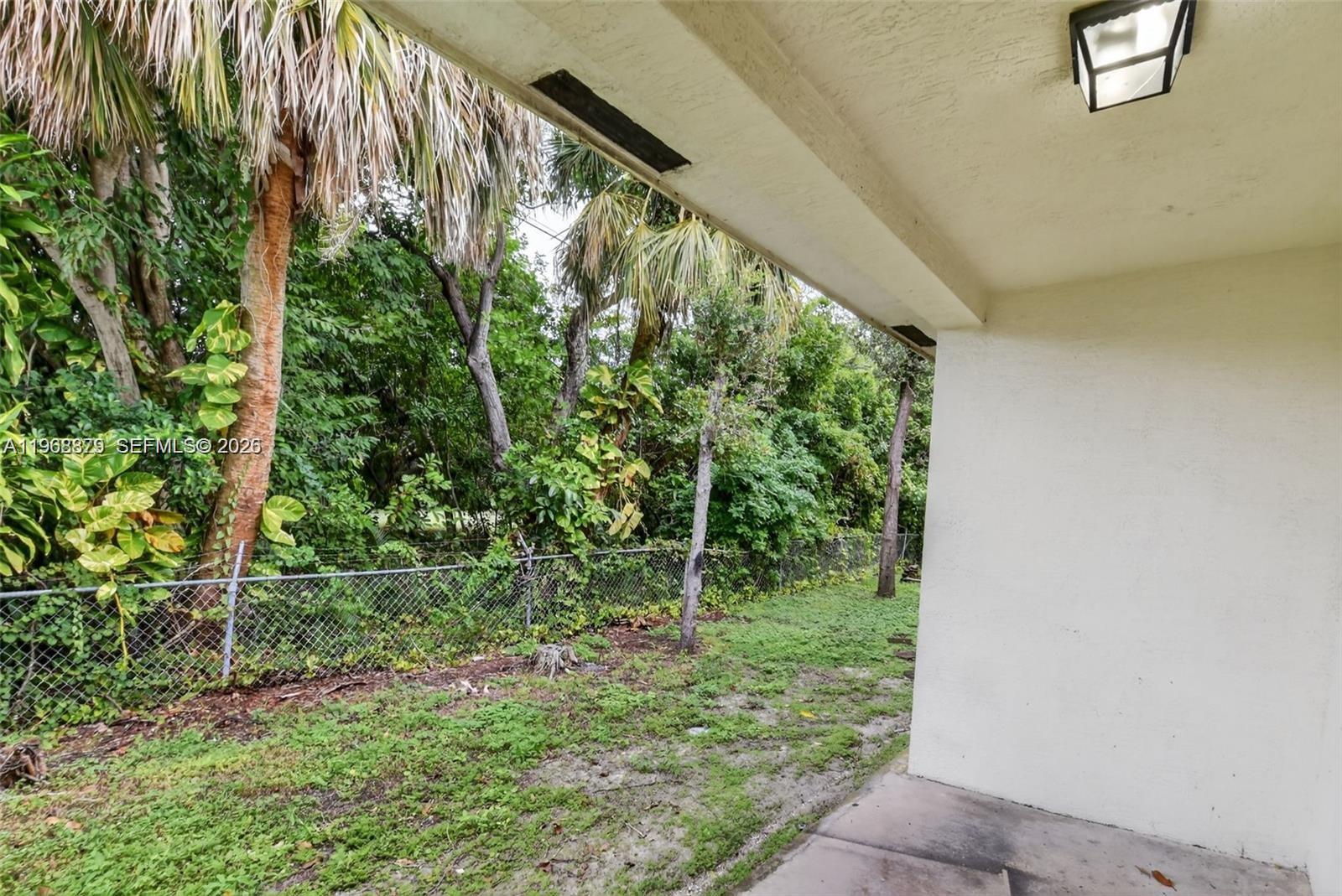 3836 Dove Landing Road West Palm Beach, FL 33403 - Photo 16 of 53 a view of a yard