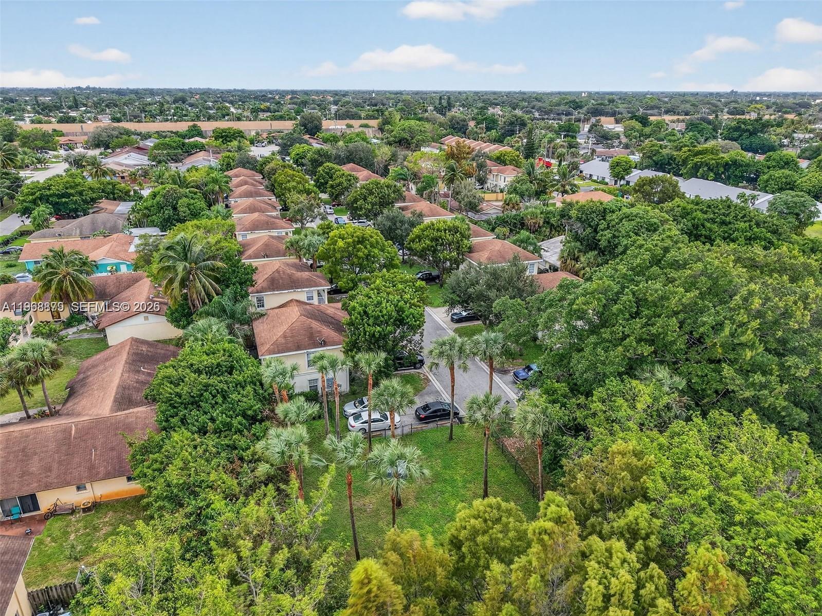3836 Dove Landing Road West Palm Beach, FL 33403 - Photo 17 of 53 an aerial view of multiple house
