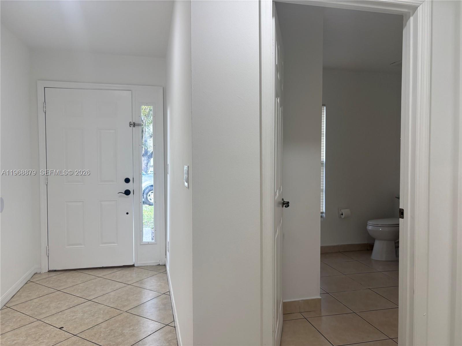 3836 Dove Landing Road West Palm Beach, FL 33403 - Photo 21 of 53 a view of a bathroom with a toilet
