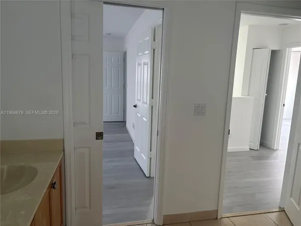 a view of a room that has a window in it