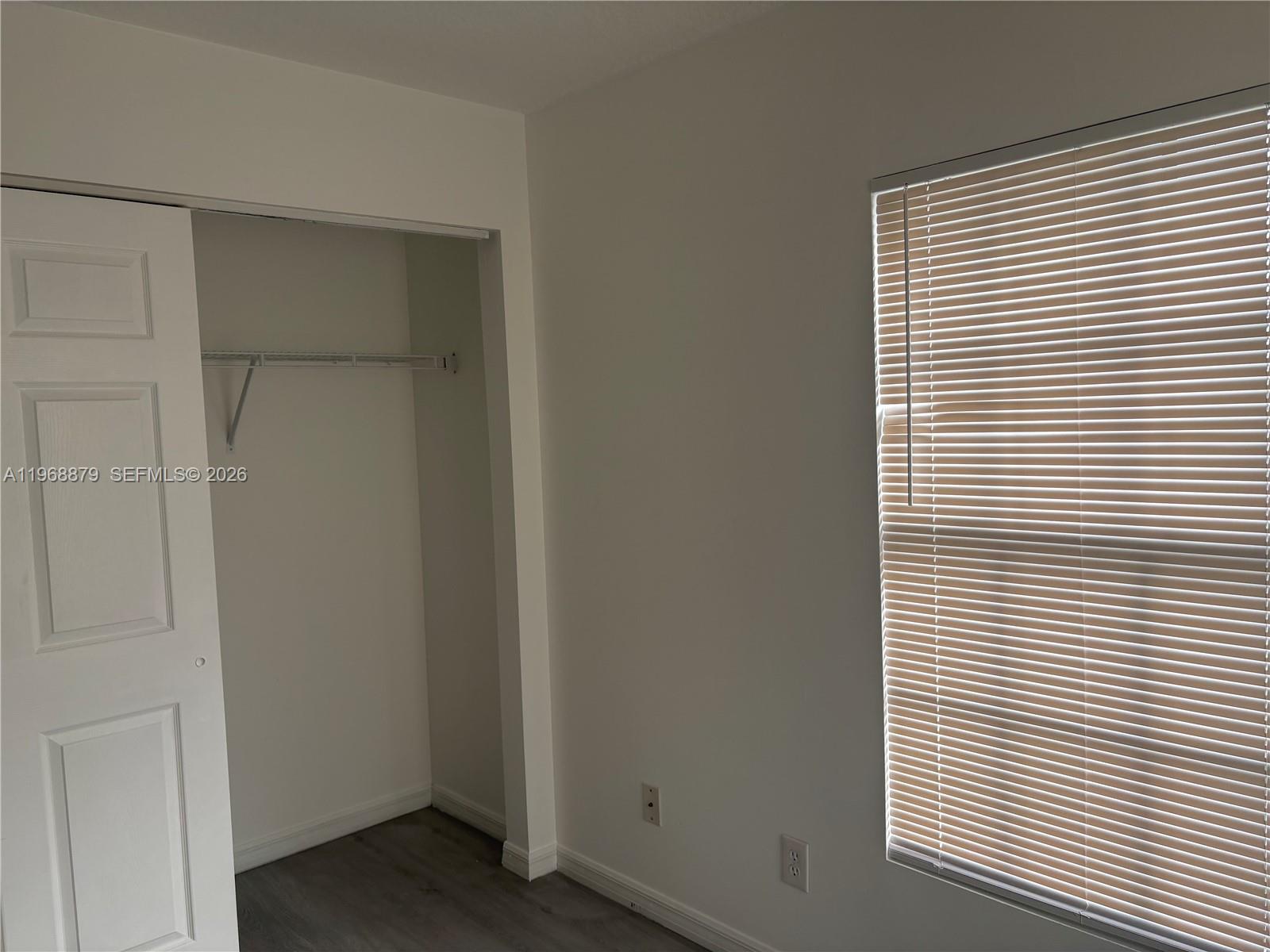 3836 Dove Landing Road West Palm Beach, FL 33403 - Photo 35 of 53 a view of a room that has a window in it