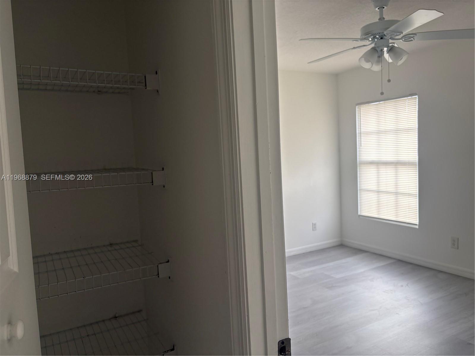 3836 Dove Landing Road West Palm Beach, FL 33403 - Photo 36 of 53 a view of room with window and ceiling fan