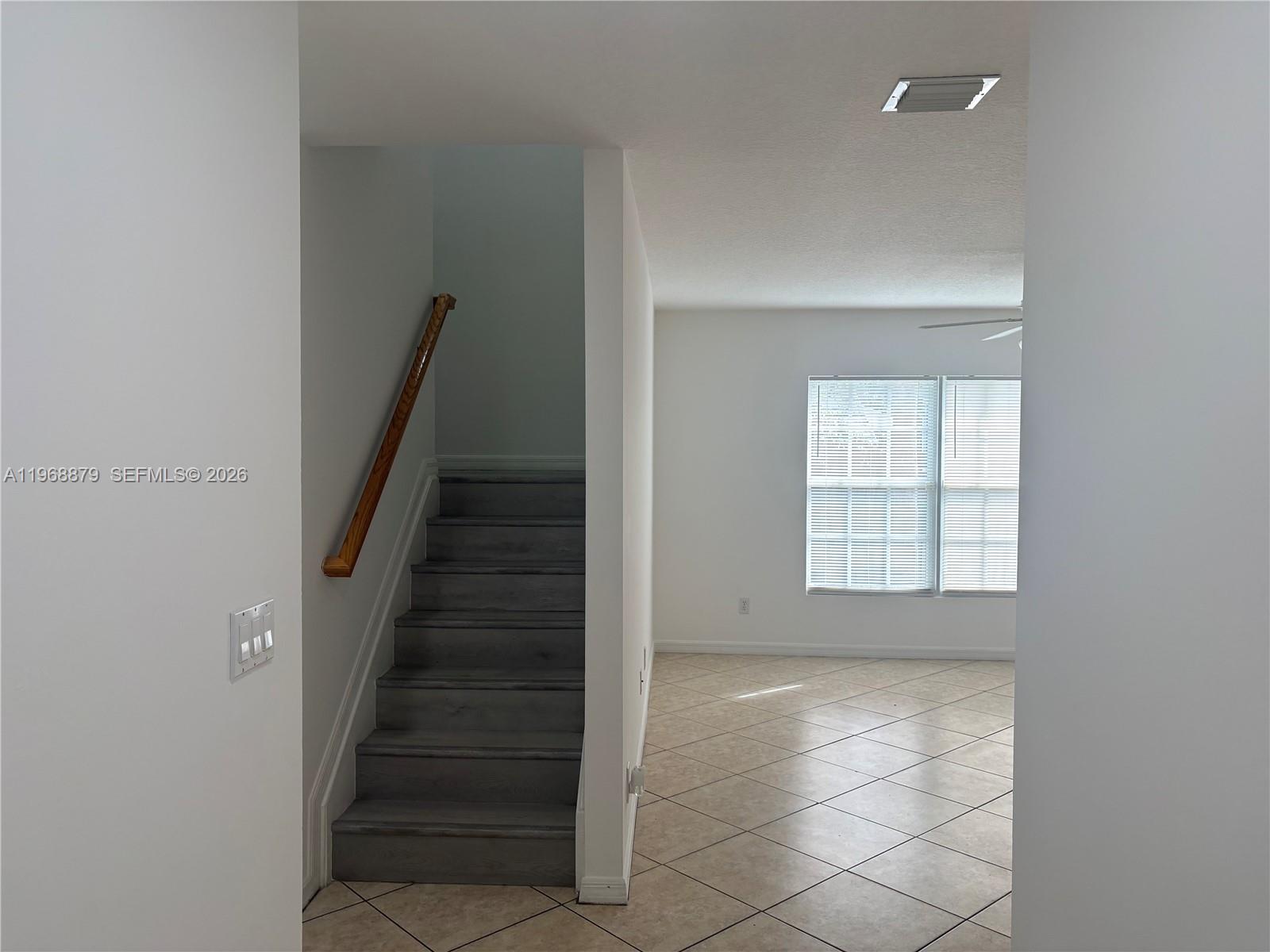 3836 Dove Landing Road West Palm Beach, FL 33403 - Photo 46 of 53 a view of an empty room with windows