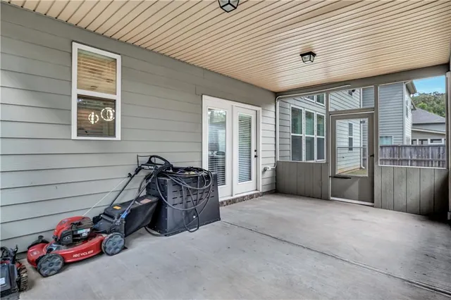 a view of a garage with parked cars