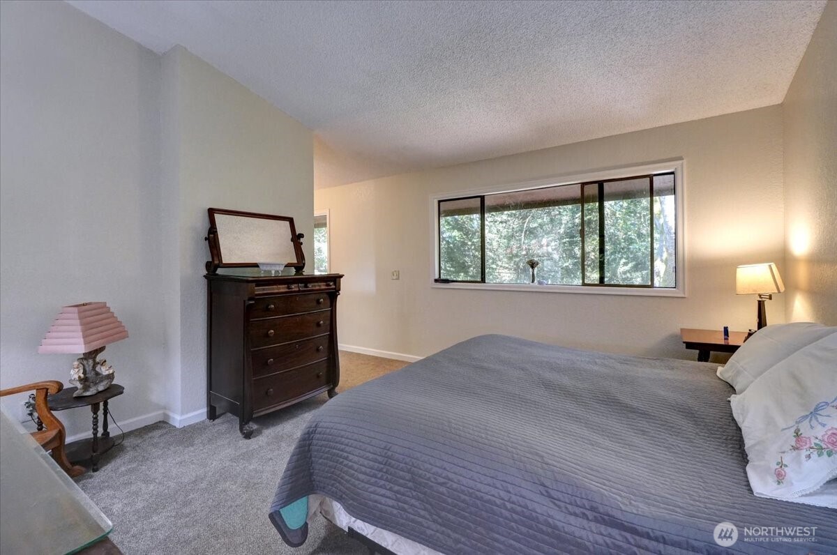 680 Southeast Prospect Street Chehalis, WA 98532 - Photo 22 of 39 a bedroom with a bed and a window