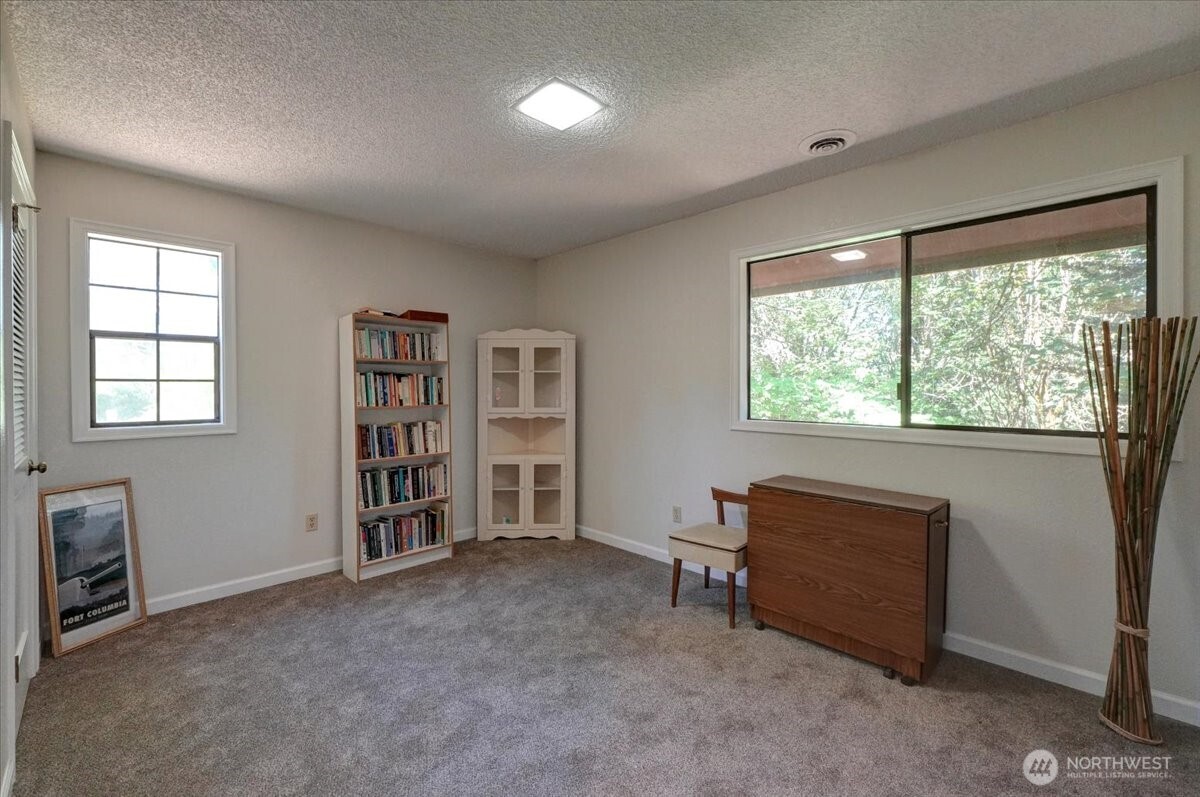 680 Southeast Prospect Street Chehalis, WA 98532 - Photo 30 of 39 a view of room with furniture and closet