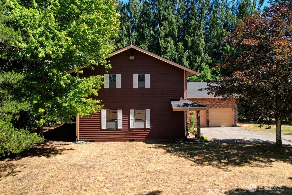 680 Southeast Prospect Street Chehalis, WA 98532 - Photo 34 of 39 a front view of a house with a yard