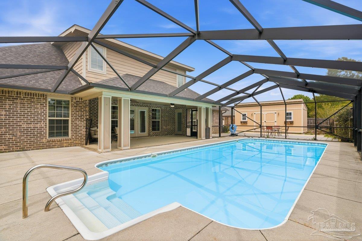 5468 Madelines Way Pace, FL 32571 - Photo 39 of 46 a view of a indoor swimming pool