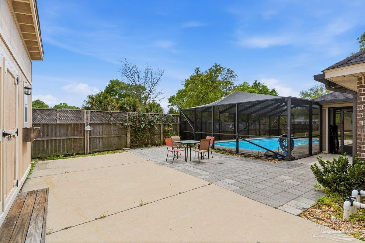 5468 Madelines Way Pace, FL 32571 - Photo 42 of 46 a view of house with backyard and sitting area