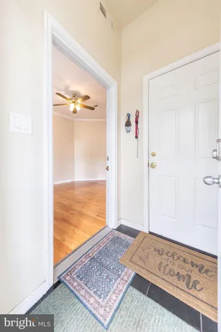 a view of a chairs and table in the backyard