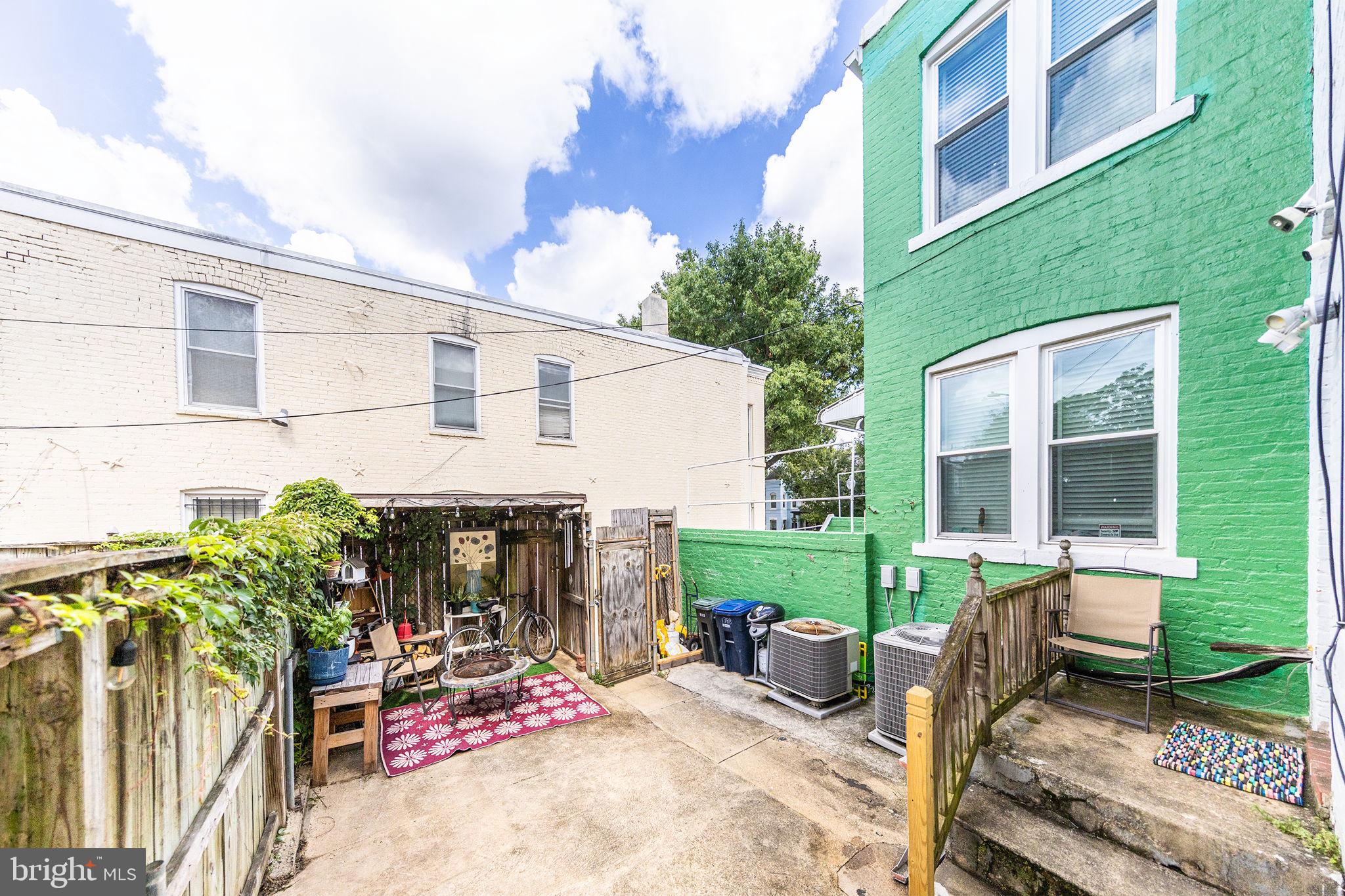 1388 Northeast E Street Northeast Washington, DC 20002 - Photo 26 of 28 a view of a chairs and table in the backyard