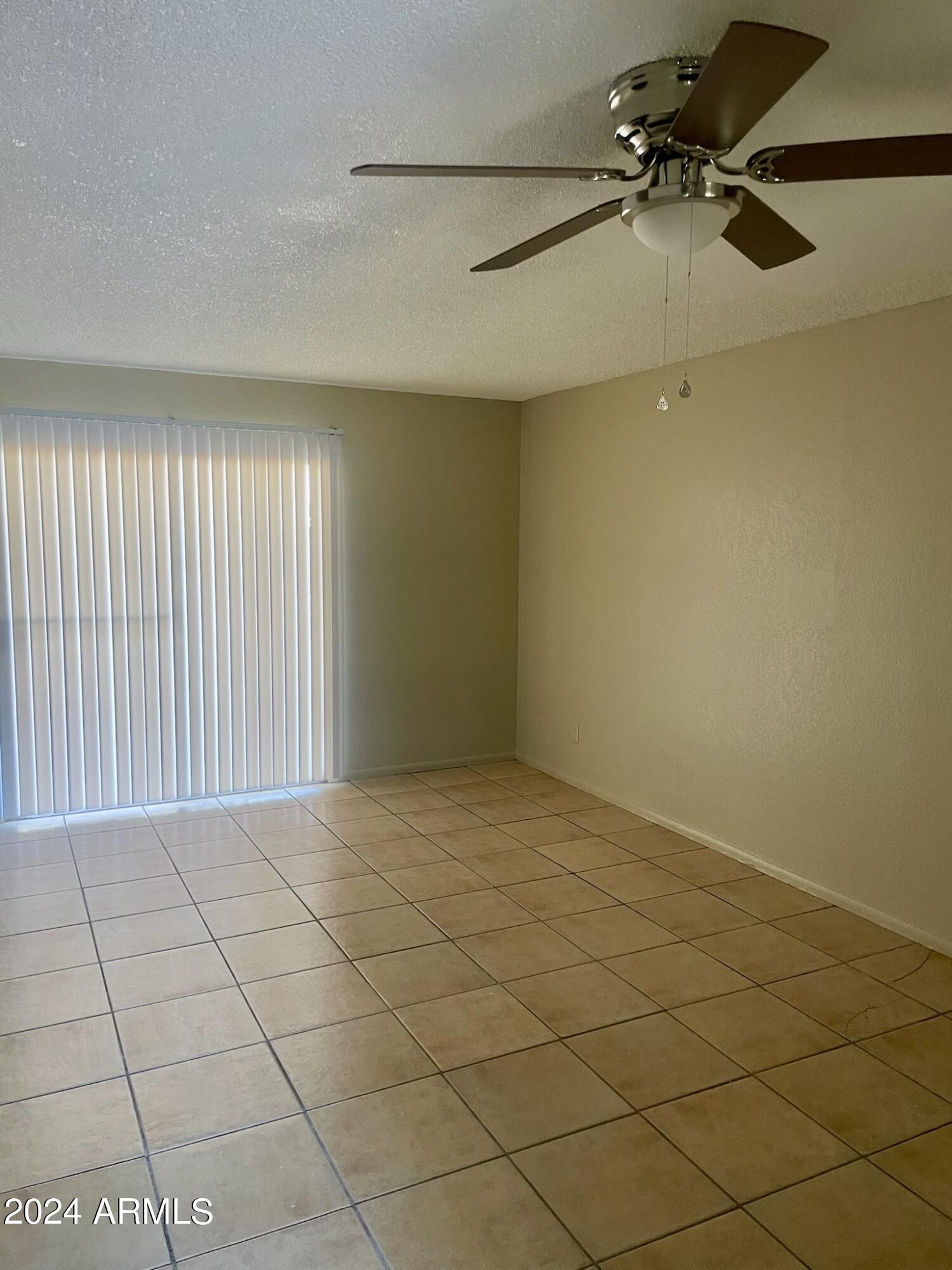 2846 East Kathleen Road, Unit 103 Phoenix, AZ 85032 - Photo 7 of 17 a view of an empty room