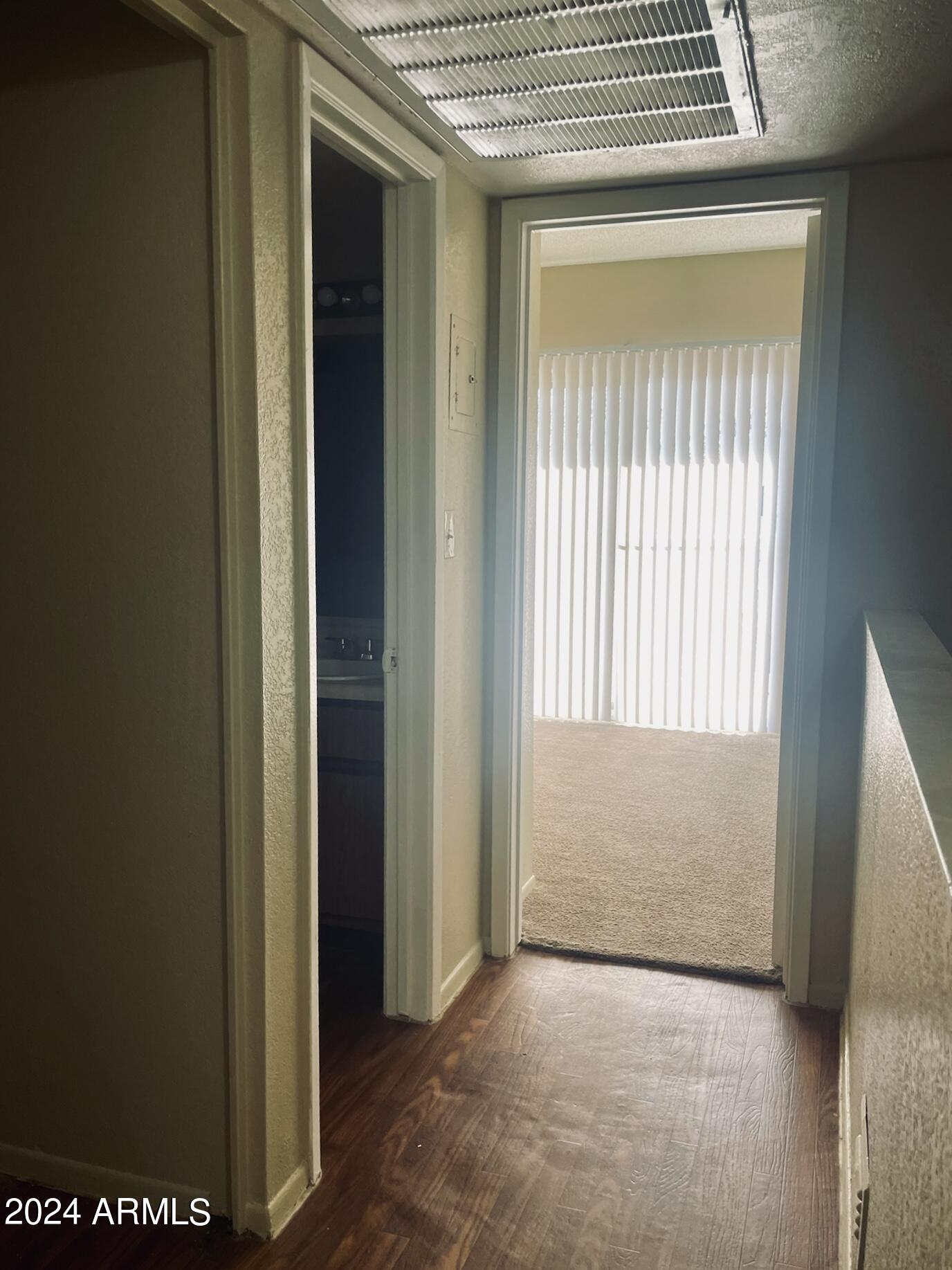 2846 East Kathleen Road, Unit 103 Phoenix, AZ 85032 - Photo 10 of 17 a view of an empty room with a window