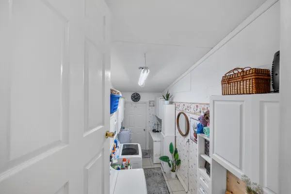 a view of entryway with furniture and toys
