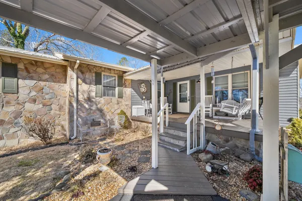 a view of a porch with furniture