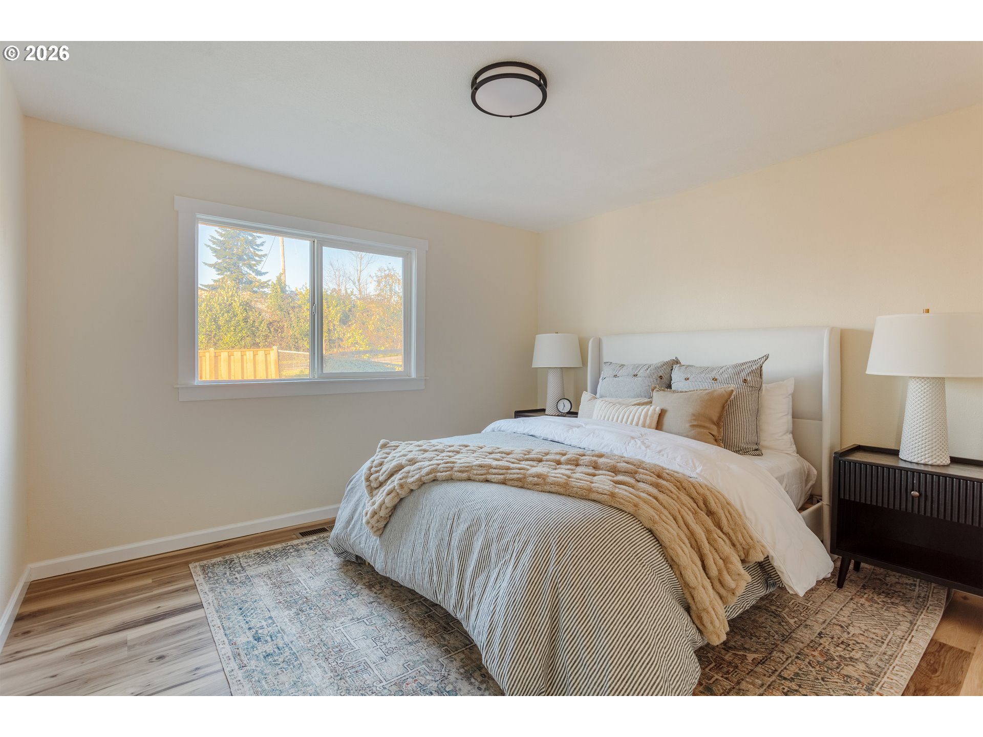 5423 Mt Vernon Road Springfield, OR 97478 - Photo 19 of 35 a bedroom with a bed and window