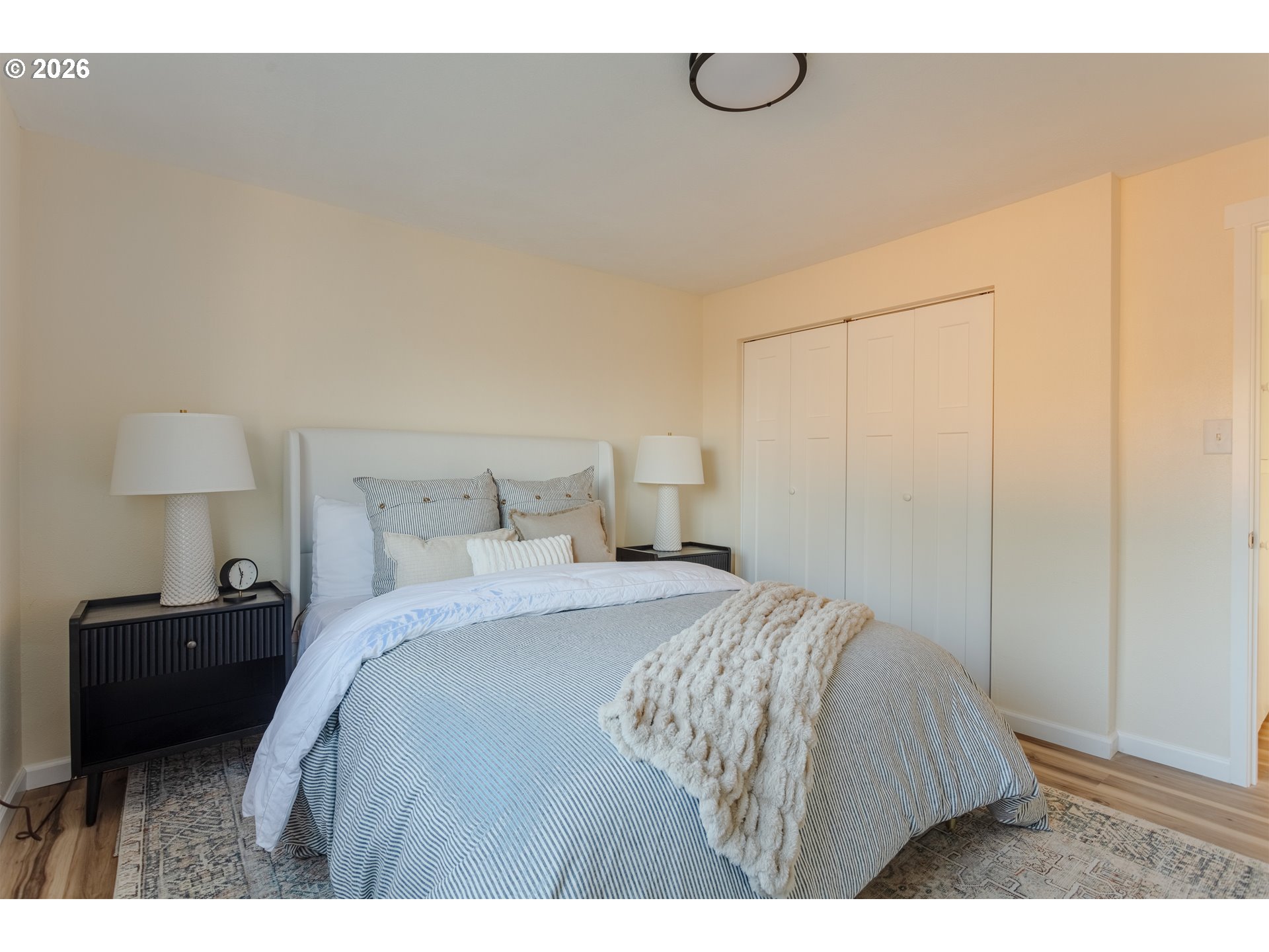 5423 Mt Vernon Road Springfield, OR 97478 - Photo 20 of 35 a bedroom with a bed and a night stand